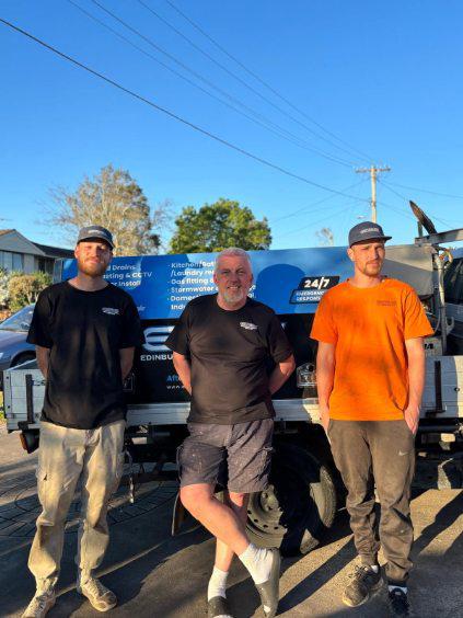 The Edinburgh Plumbing Services team in front of their work ute